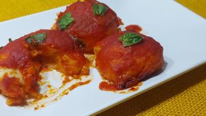 polpette di polenta al forno filanti